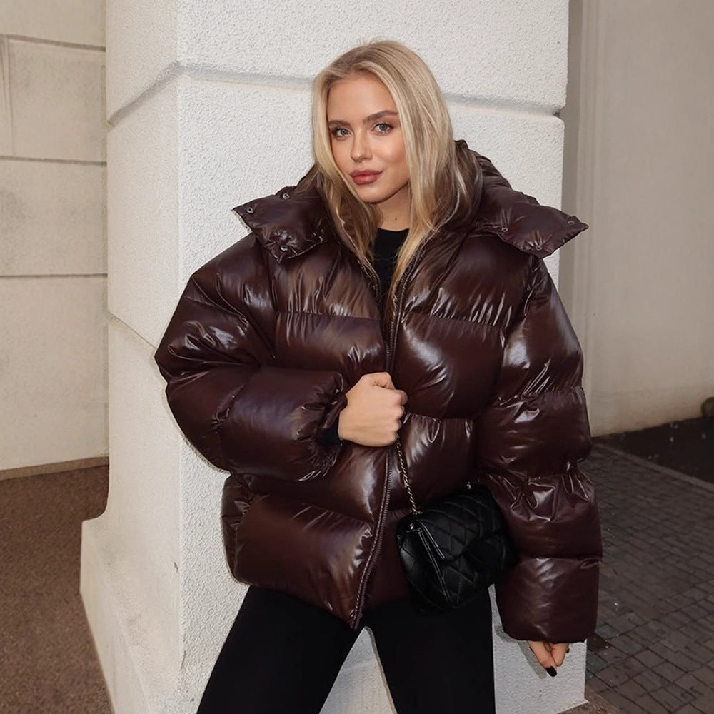 Damen Oversize Steppjacke in Lackoptik mit hohem Kragen und wattierter Fütterung Echoarchiv