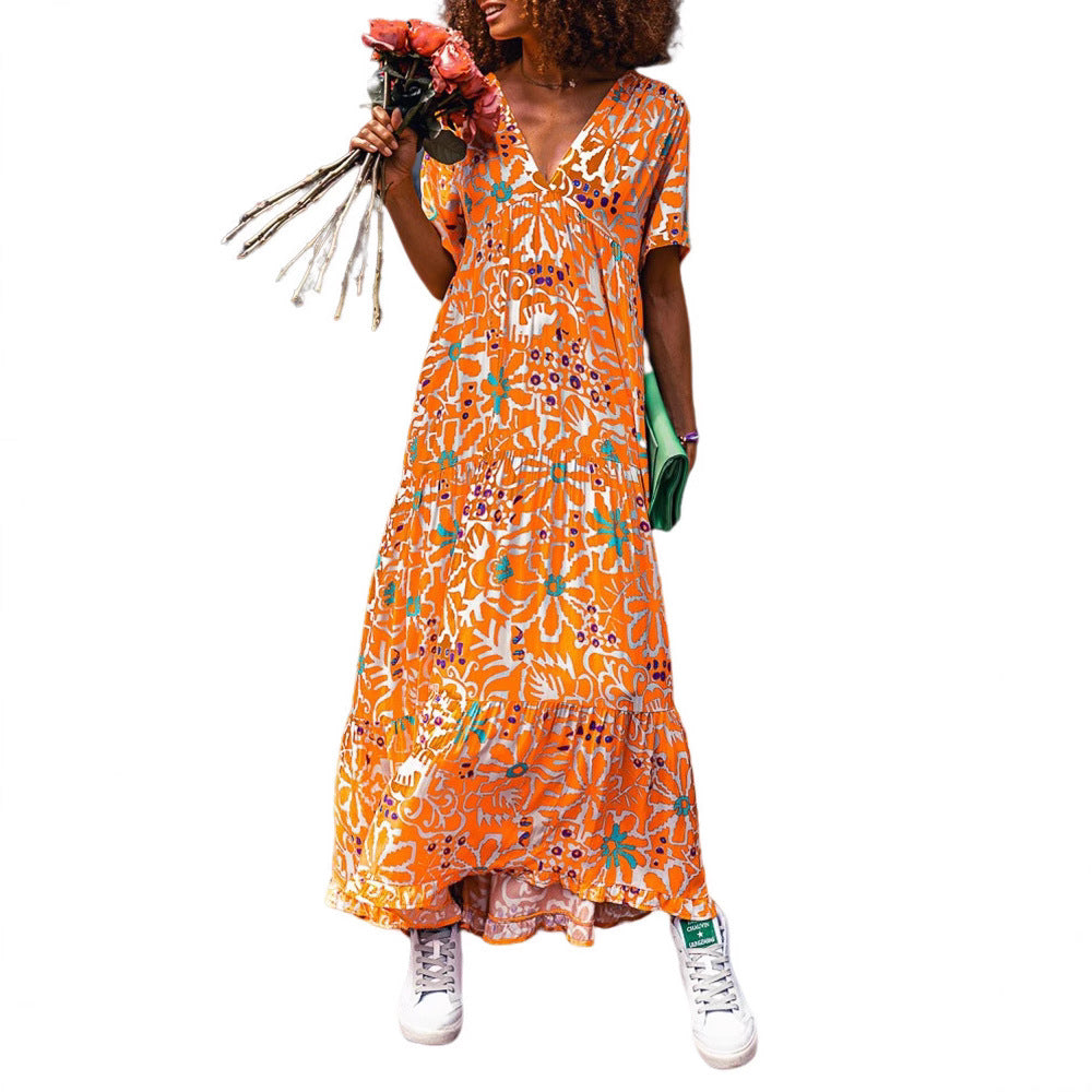 Damen nan knöchellanges V-Ausschnitt-Maxikleid mit grafischem Ethno-Print, kurzen Ärmeln und schwingender Volantbahn Echo Archiv