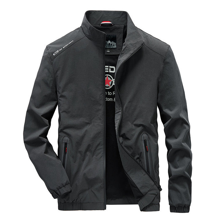 Herren Leichte Softshell-Windjacke mit Stehkragen wasserabweisenden Reißverschlüssen und Mesh-Innenfutter – Taviero