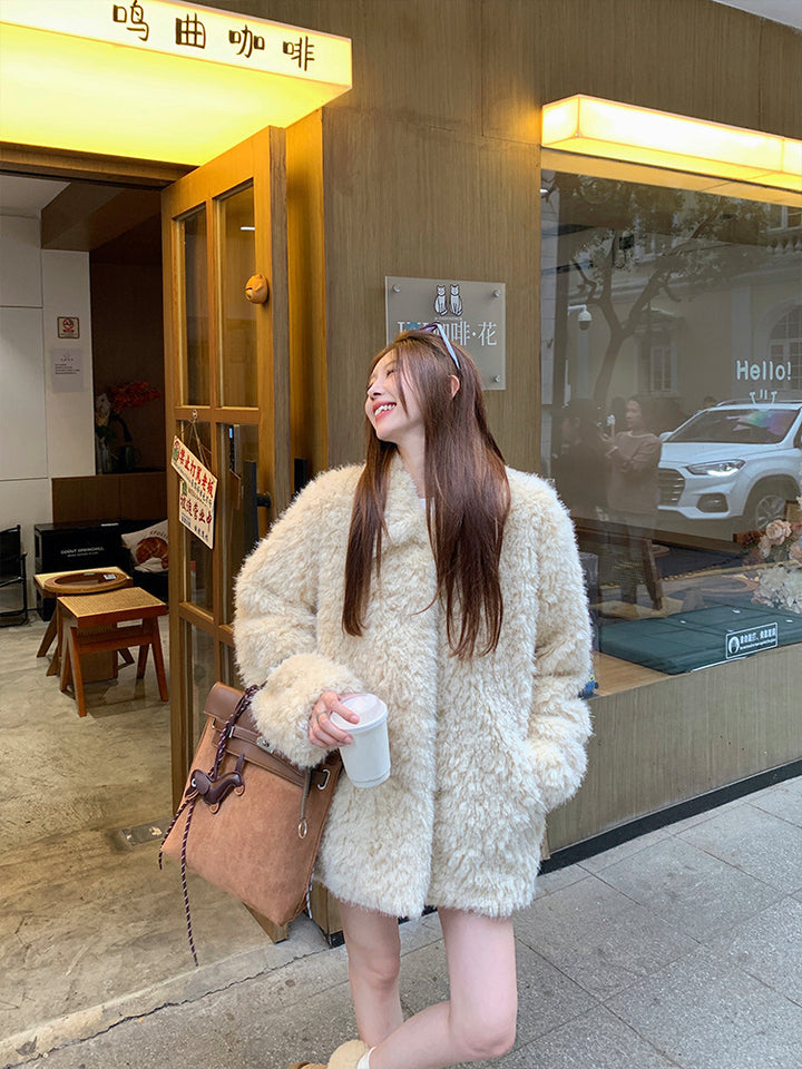 Damen Oversized Kunstfell‑Mantel mit Teddy‑Optik, Stehkragen und Eingrifftaschen Echoarchiv