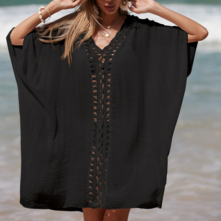 Damen eleganter Strandponcho mit raffinierten Häkelakzenten und tiefem V-Ausschnitt Echo Archiv