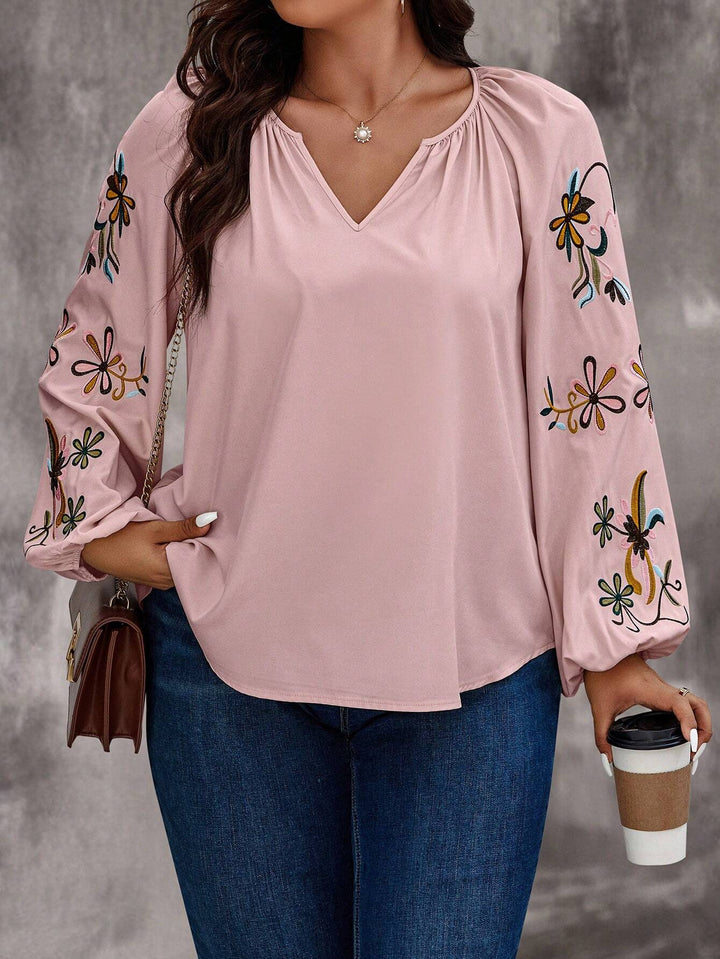 Damen Locker sitzende V-Ausschnitt Bluse mit floraler Stickerei an Ballonärmeln – Élovi