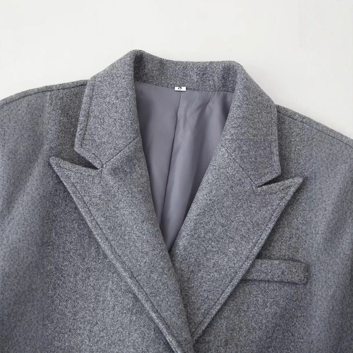 Damen langer zweireihiger Wollmix Mantel mit Fransenabschluss und Pattentaschen – Montévia
