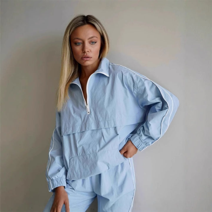 Damen Oversized Windjacke Halbzip-Anorak mit Kängurutasche und Paspelierung – Célinea