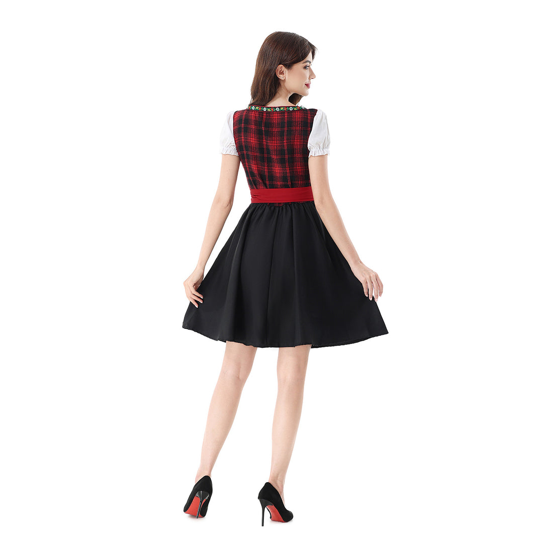 Damen nan traditionelles Dirndlkleid mit kariertem Mieder, Schnürung, Puffärmeln und Schürze Echo Archiv