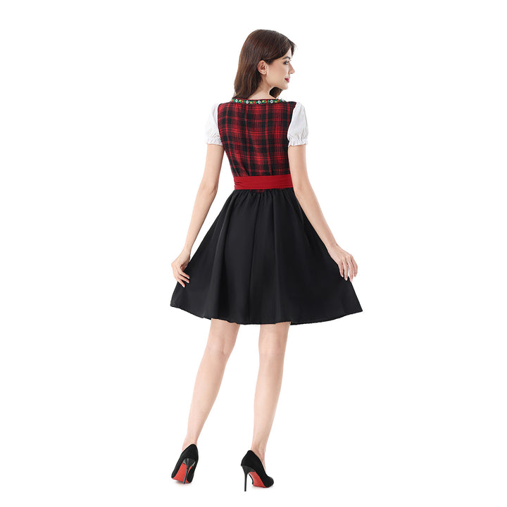 Damen nan traditionelles Dirndlkleid mit kariertem Mieder, Schnürung, Puffärmeln und Schürze Echo Archiv