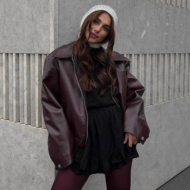 Damen Kurze Oversized Lederimitat-Flightjacke mit markantem Revers und Druckknopf-Manschetten Echoarchiv
