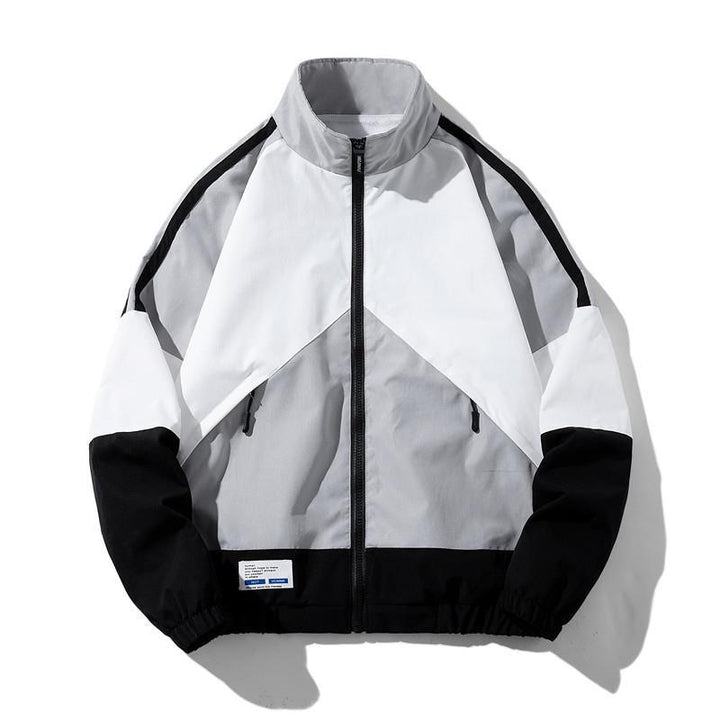 Herren Leichte Windbreaker-Trackjacke im geometrischen Colorblock mit Mesh‑Futter, Stehkragen & Reißverschluss Echoarchiv
