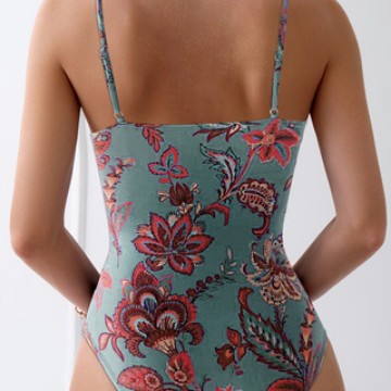 Damen Einteiler Badeanzug mit floralem Raffungselement Echo Archiv