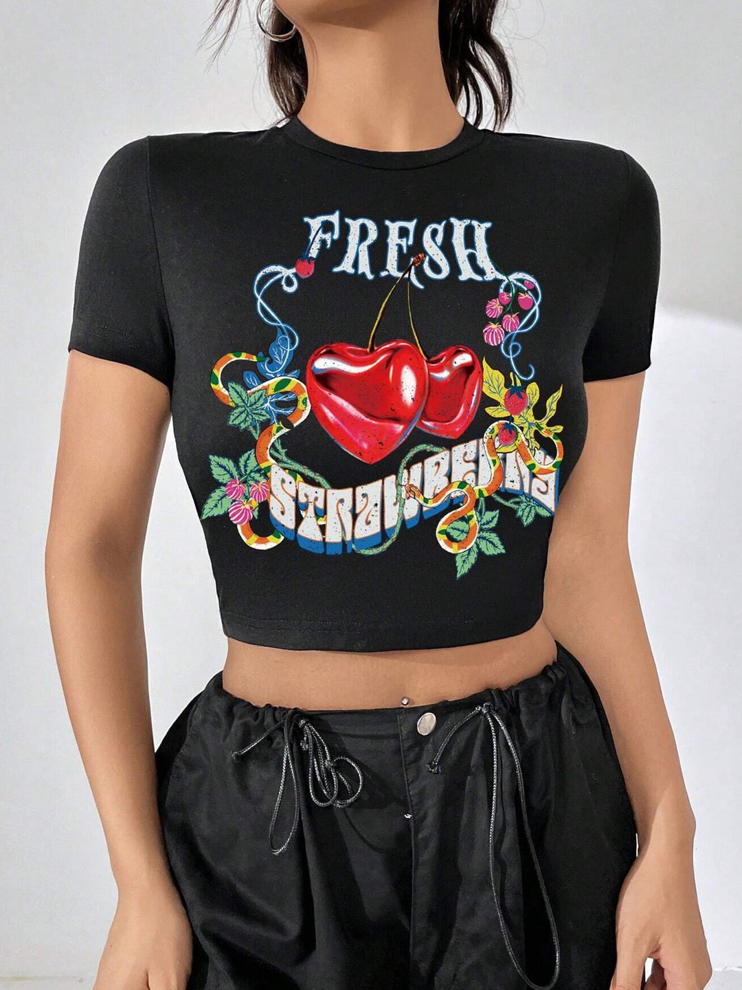 Damen Crop-Top mit floralem Grafikdruck und figurbetontem Schnitt Echo Archiv