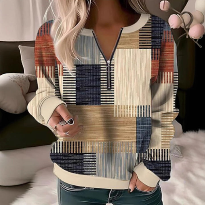 Damen nan gemütlicher Pullover mit kurzem Reißverschluss, grafischem Patchworkmuster, verlängerten Ärmelbündchen und geripptem Saum Echo Archiv