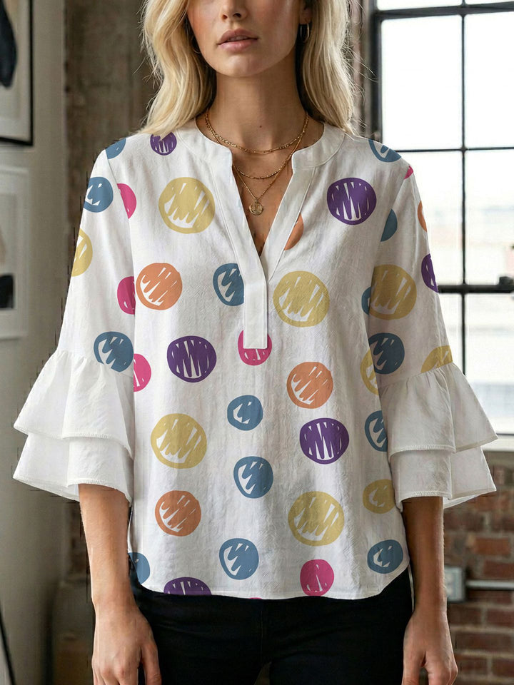 Damen Bluse mit voluminösen Flügelärmel und intensivem Blattmuster Echo Archiv