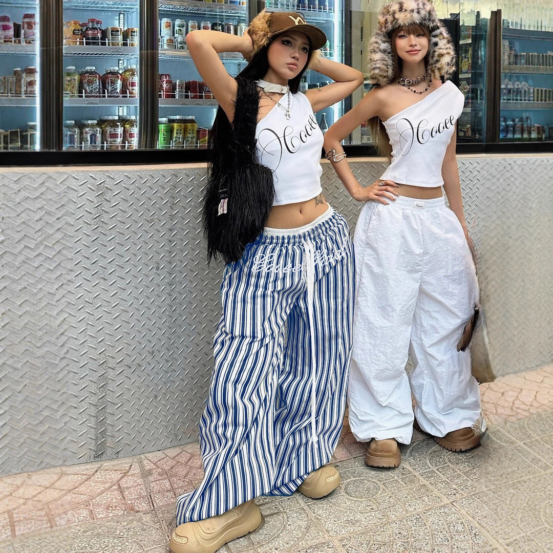 Damen Weite gestreifte Sommerhose mit elastischem Bund und praktischen Taschen Echo Archiv