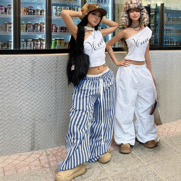 Damen Weite gestreifte Sommerhose mit elastischem Bund und praktischen Taschen Echo Archiv