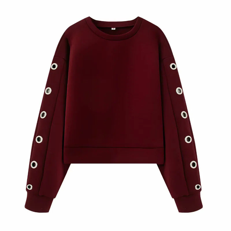 Damen kurzes Oversize Sweatshirt mit dekorativen Metallösen an den Ärmeln – Mavelle