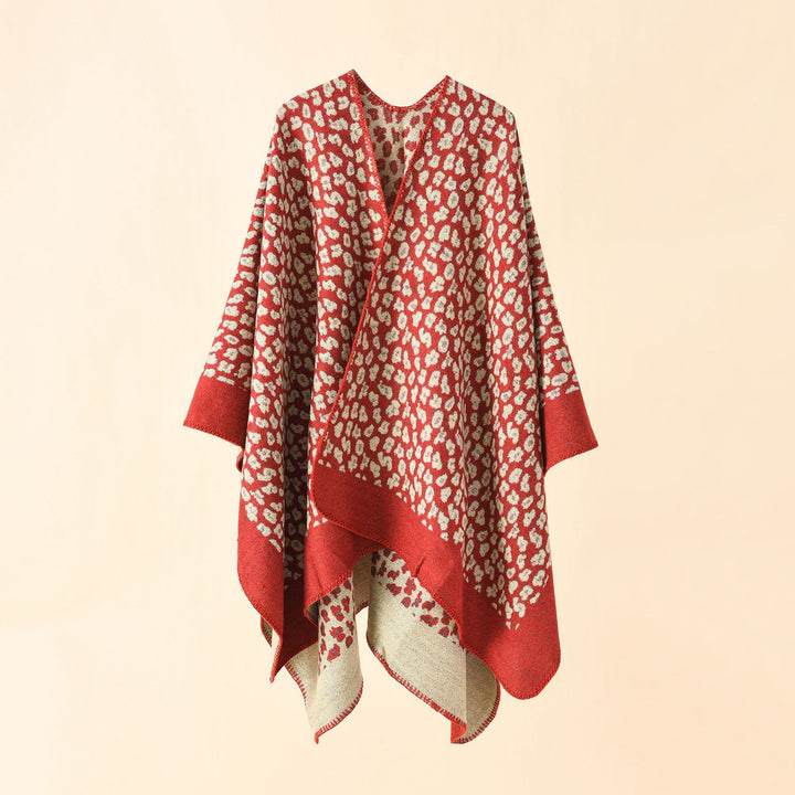 Damen Wollmix-Ruana mit tonigem Leopardenjacquard und kastigem Kimono-Fall – Montévia