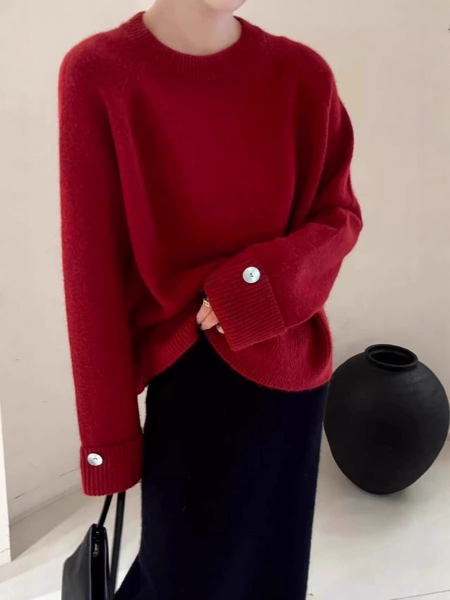 Damen Oversize-Rundhalspullover mit verlängerten Manschetten und Zierknopf Echoarchiv