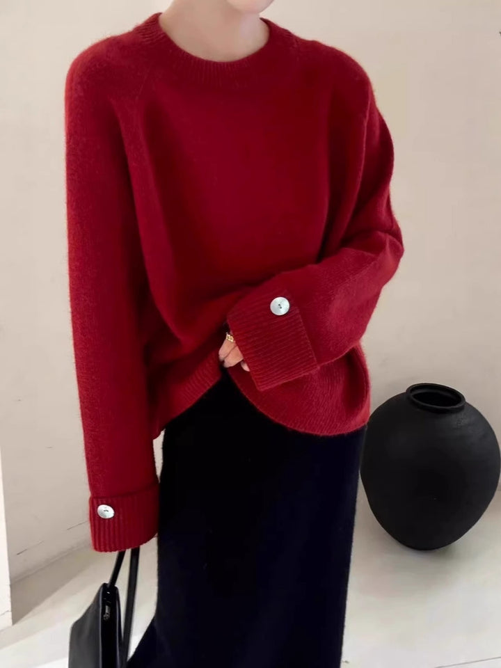 Damen Oversize-Rundhalspullover mit verlängerten Manschetten und Zierknopf Echoarchiv