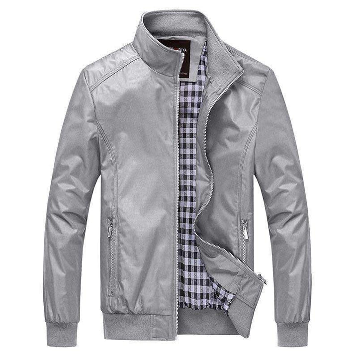 Herren Kurzblouson mit Stehkragen, Karo-Innenfutter und Rippenbündchen Echoarchiv