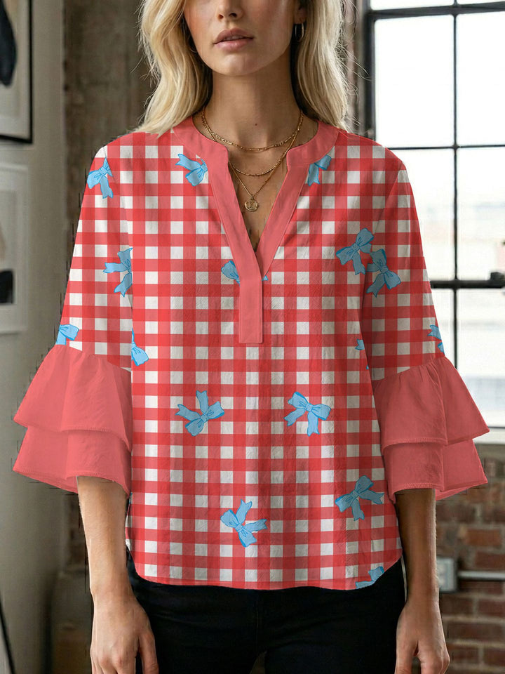 Damen Blusenshirt mit voluminösen Ärmeln und kreativem Druckdesign Echo Archiv