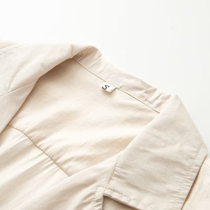 Damen Oversize-Bluse mit Reverskragen und durchgehender Knopfleiste Echoarchiv