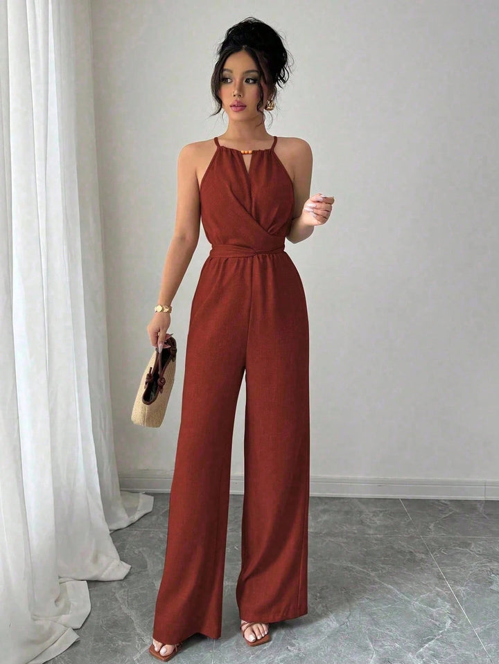 Damen Ärmelloser Neckholder-Jumpsuit mit Wickeloberteil und weitem Bein Echo Archiv