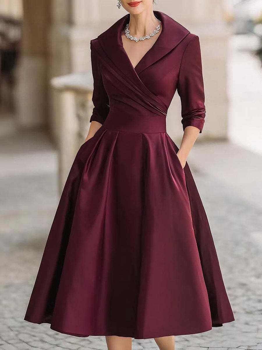 Damen nan elegantes Midikleid mit Wickeloberteil, Dreiviertelärmeln und Eingrifftaschen Echo Archiv