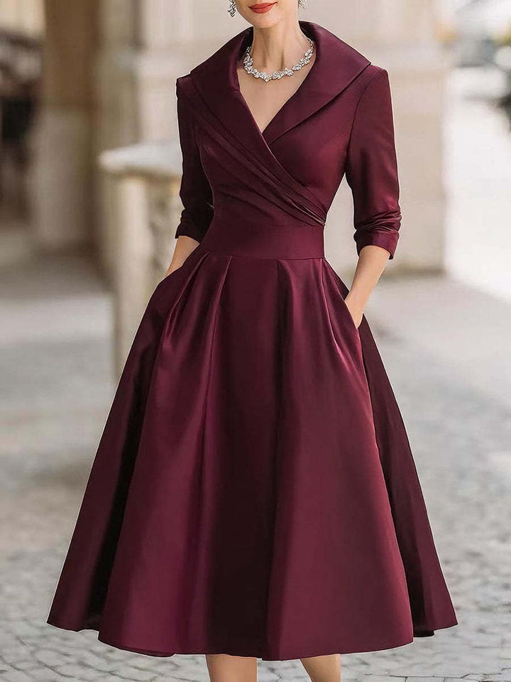 Damen nan elegantes Midikleid mit Wickeloberteil, Dreiviertelärmeln und Eingrifftaschen Echo Archiv