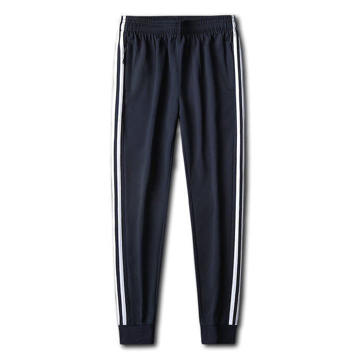 Herren Slim-Fit Trackhose mit seitlichen Kontraststreifen, Reißverschlusstaschen und elastischem Bund – Sorevano