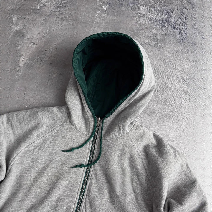 Unisex nan weit geschnittene Windjacke mit Kapuze wattiertem Fleeceinnenfutter Tunnelzugsaum und Zierstreifen an Ärmeln Echo Archiv