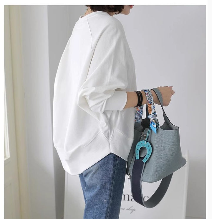 Damen Oversize-Sweatshirt mit Raglanärmeln, abgerundetem Saum und Seitenschlitzen Echoarchiv
