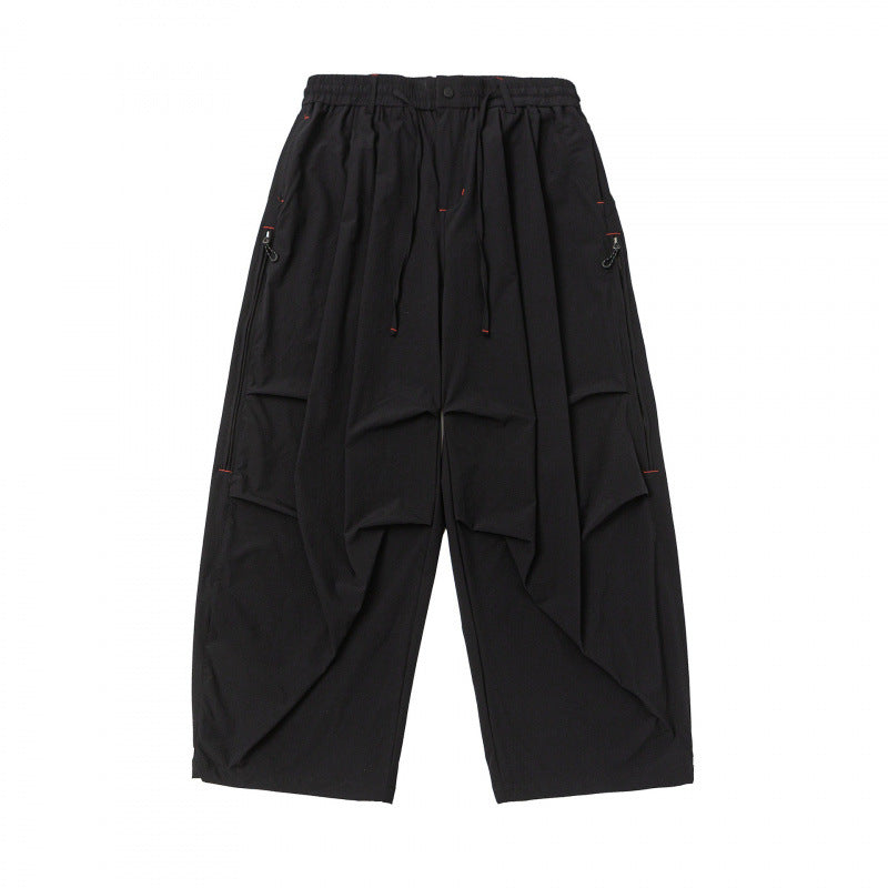 Unisex Weitgeschnittene technische Cargo-Hose mit Gummibund, Kordelzug und Reißverschlusstaschen Echo Archiv