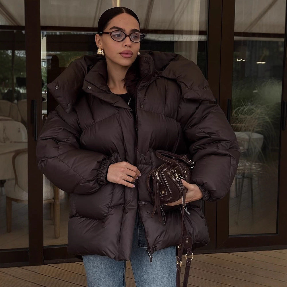 Damen Oversize Steppjacke mit hohem Schalkragen und wattierter Füllung Echoarchiv