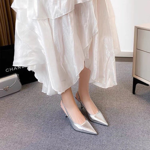 Damen Slingback-Pumps mit spitz zulaufender Silhouette und schimmernder Oberflächenstruktur Echoarchiv