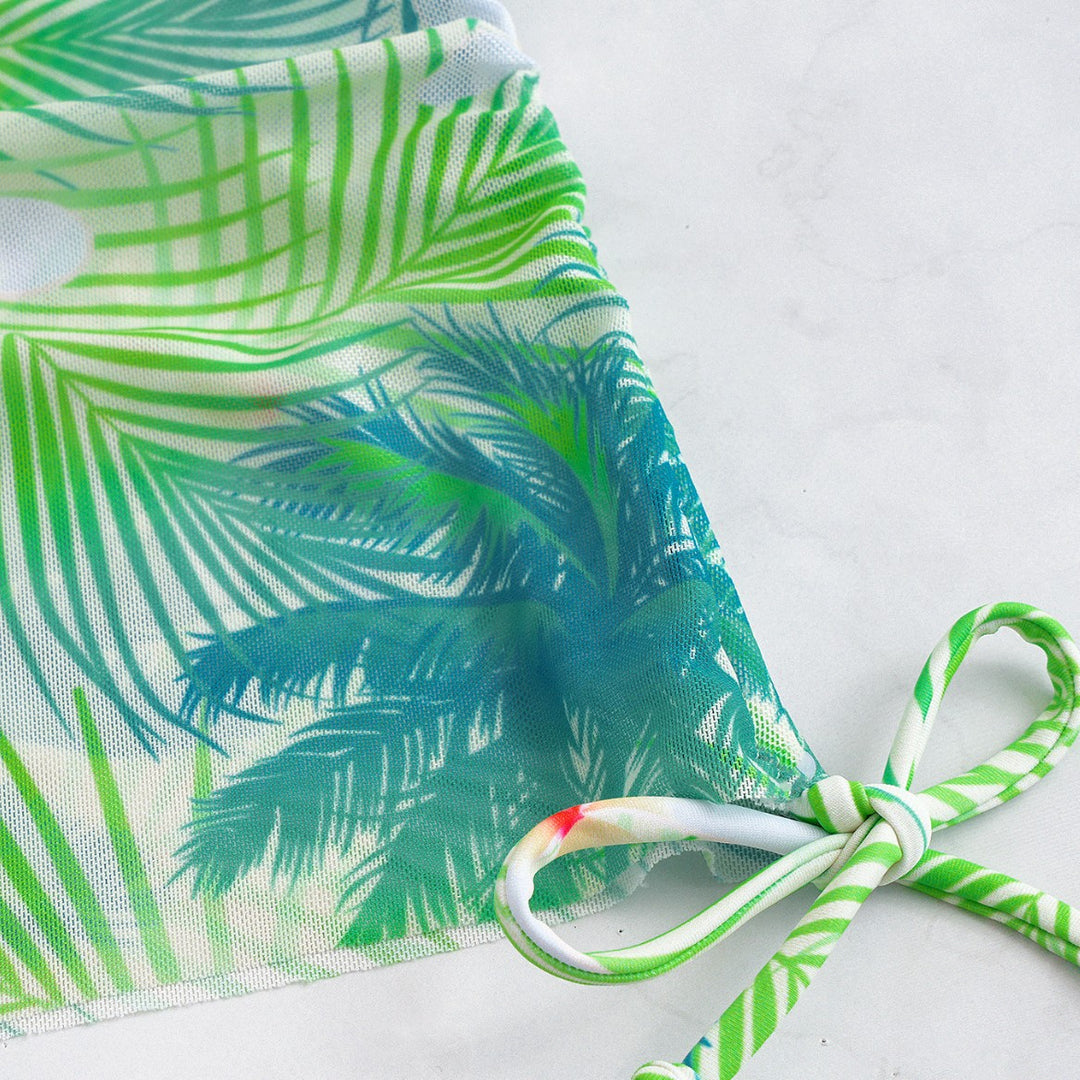Damen Bikini-Set mit elegantem Wickelrock und tropischem Design Echo Archiv