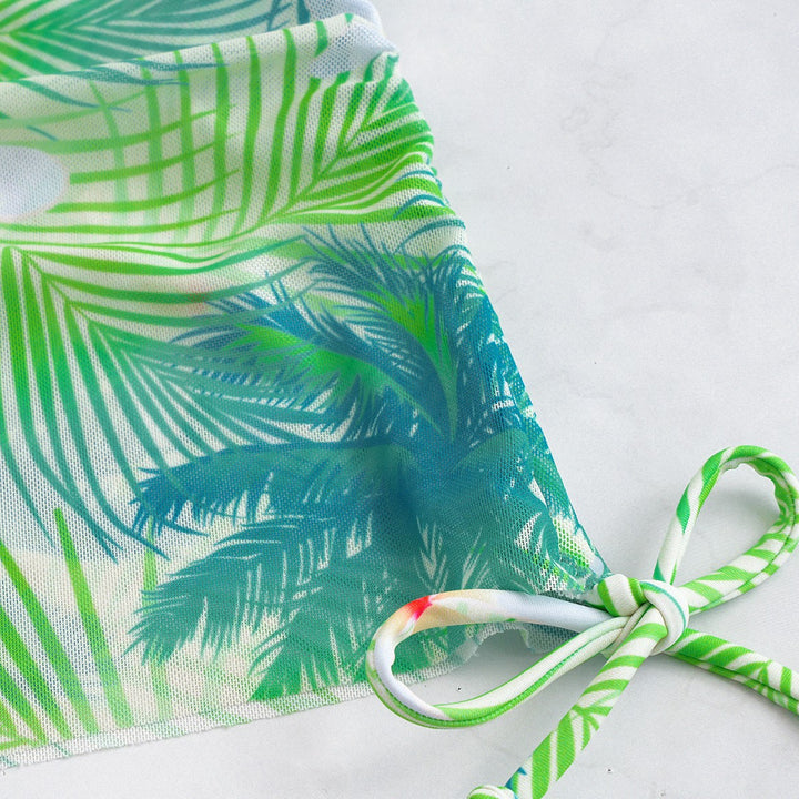 Damen Bikini-Set mit elegantem Wickelrock und tropischem Design Echo Archiv