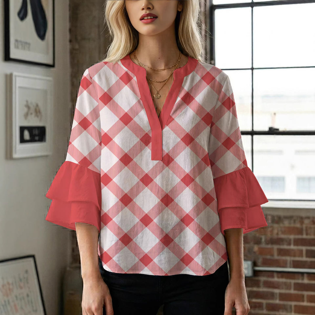 Damen Bluse mit voluminösen Flügelärmel und intensivem Blattmuster Echo Archiv