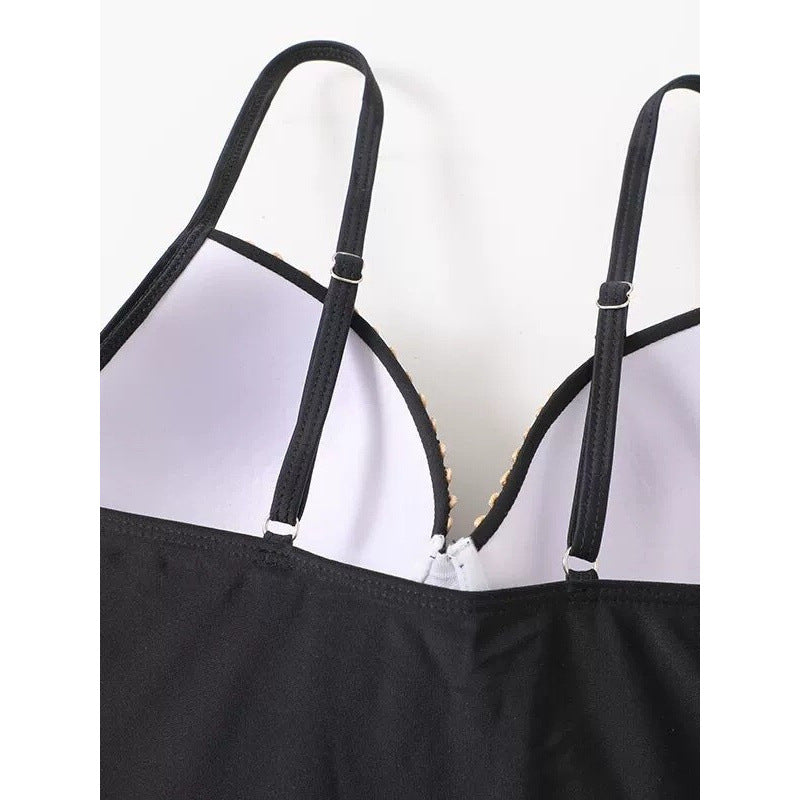 Damen Einteiler Badeanzug mit eleganten Überwurf-Details Echo Archiv