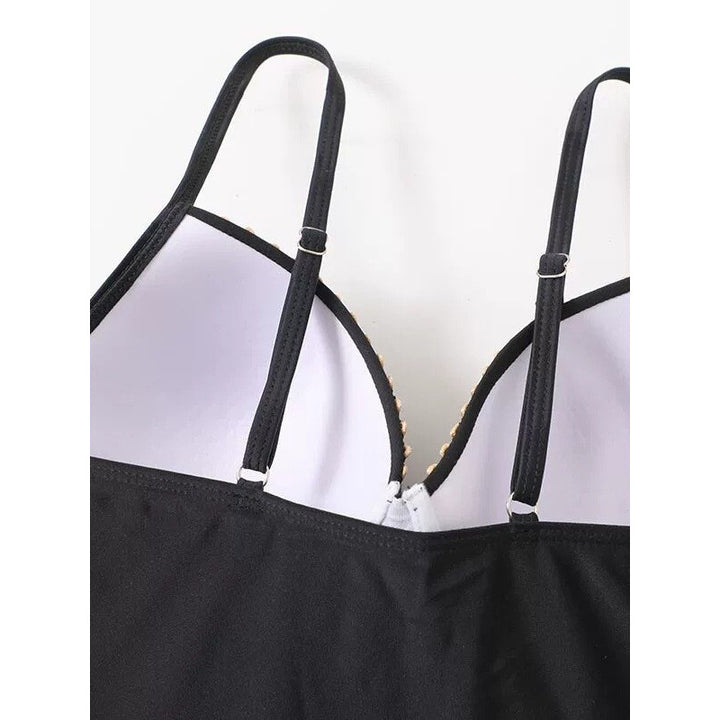 Damen Einteiler Badeanzug mit eleganten Überwurf-Details Echo Archiv