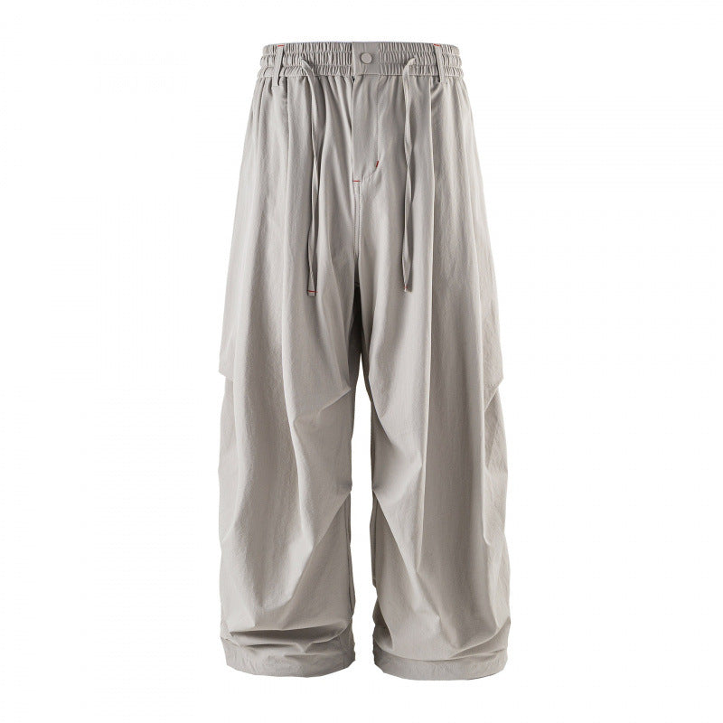 Unisex Weitgeschnittene technische Cargo-Hose mit Gummibund, Kordelzug und Reißverschlusstaschen Echo Archiv