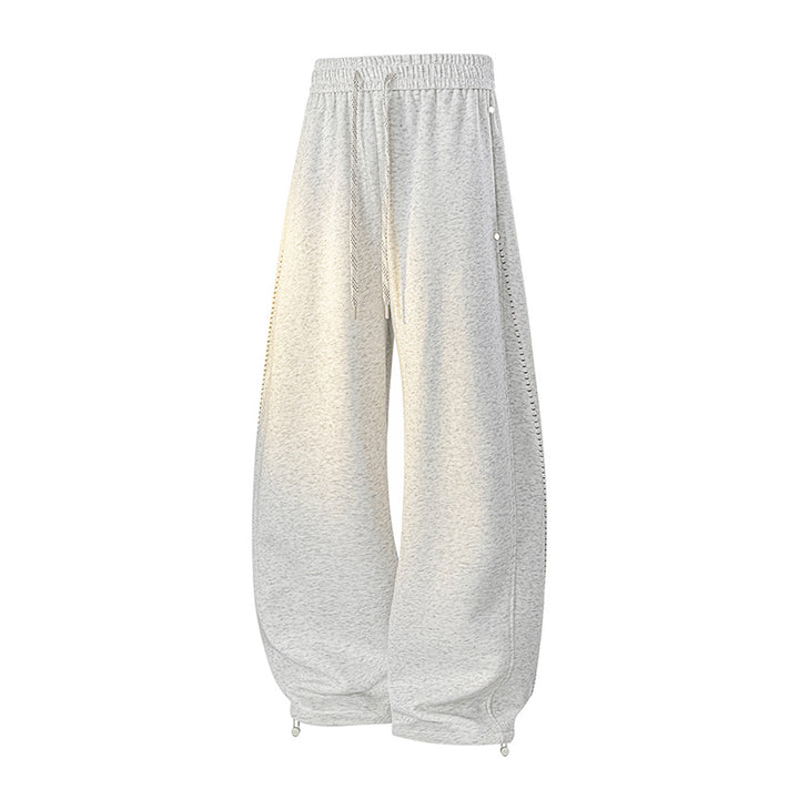 Herren Oversize-Baggy-Jogginghose mit Tunnelzug, seitlicher Druckknopfleiste & verstellbaren Beinabschlüssen Echoarchiv