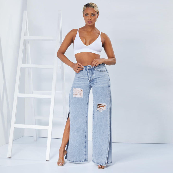 Damen weite High-Waist-Jeans mit seitlichen Beinschlitzen, Destroyed-Knie und formendem Bund Echo Archiv