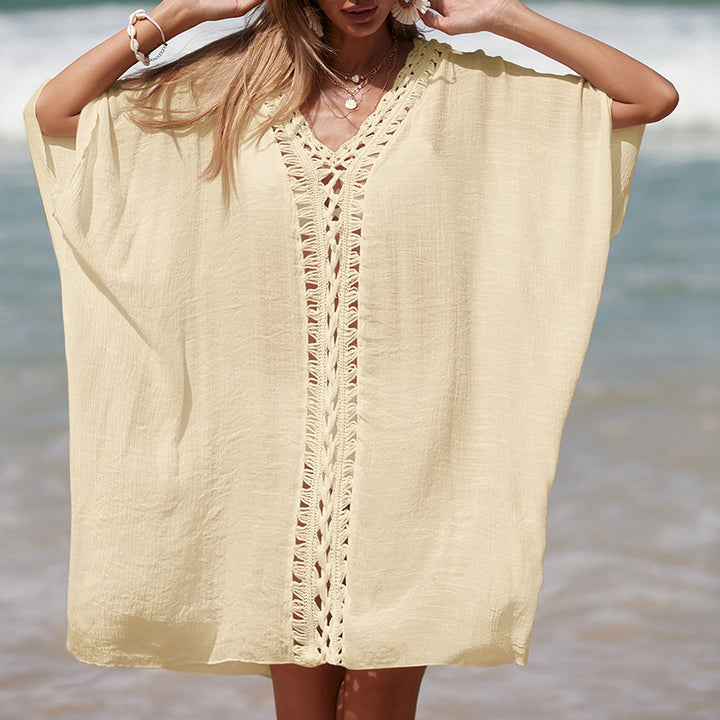 Damen eleganter Strandponcho mit raffinierten Häkelakzenten und tiefem V-Ausschnitt Echo Archiv