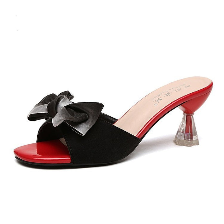 Damen nan elegante Mule mit dekorativer Schleifenapplikation, skulpturellem Transparentabsatz und lackiertem Komfortfußbett Echo Archiv