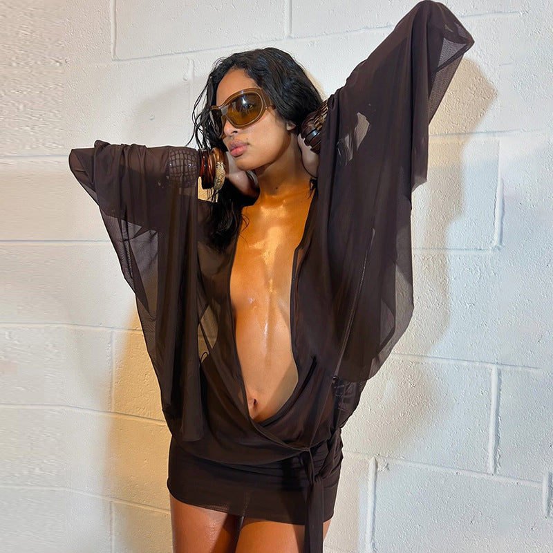 Damen Wickelbluse mit transparenten Ärmeln und figurformendem Design Echo Archiv