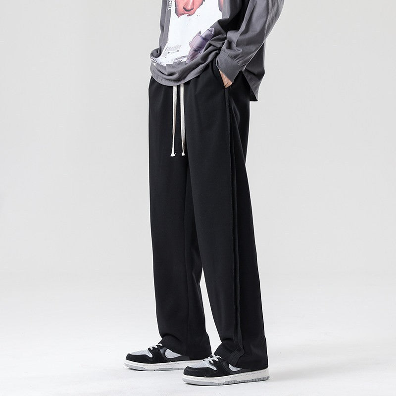 Herren weite Jogginghose im Oversize-Schnitt mit Seitenstreifen, Kordelzug & Fleecefutter Echo Archiv