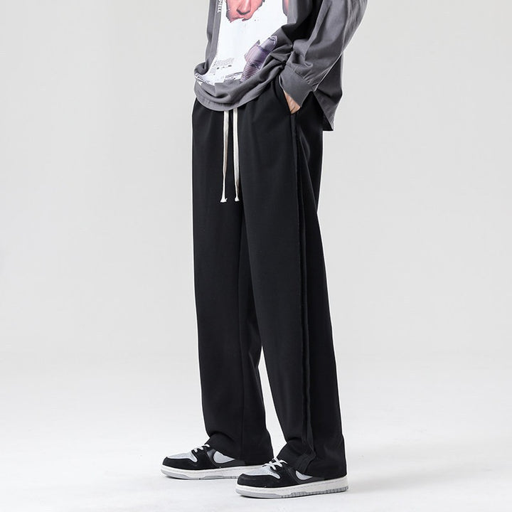 Herren weite Jogginghose im Oversize-Schnitt mit Seitenstreifen, Kordelzug & Fleecefutter Echo Archiv