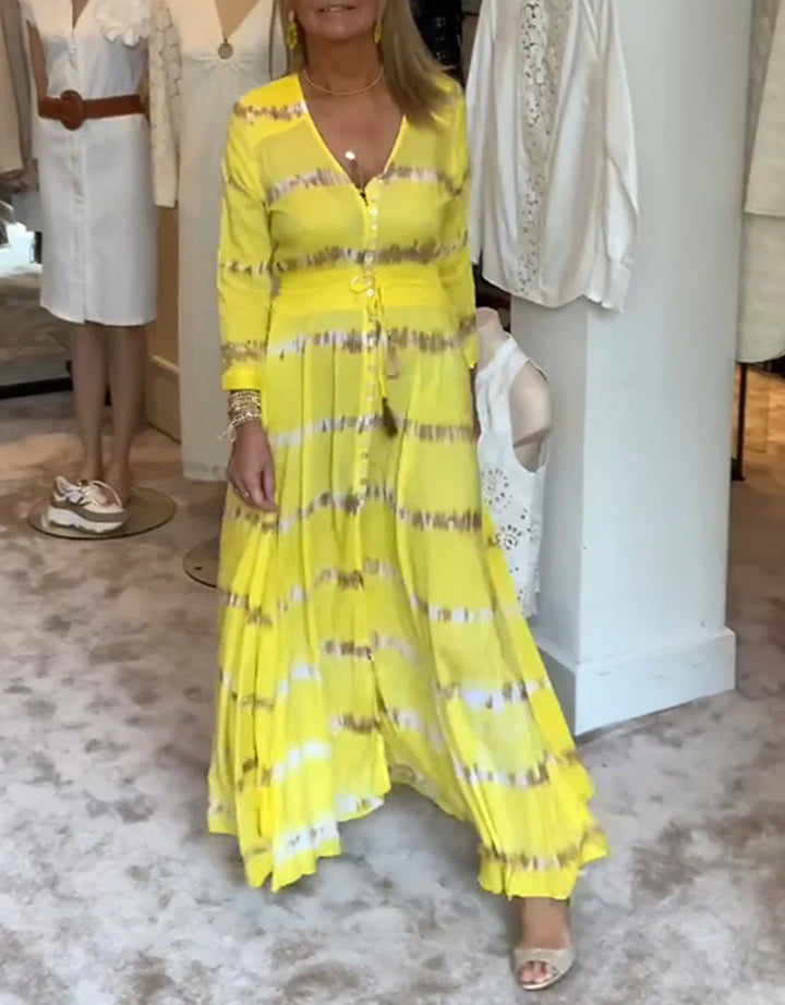 Damen nan fließendes Maxikleid mit V-Ausschnitt, durchgehender Knopfleiste, taillierendem Quastenband und plissiertem Rock Echo Archiv