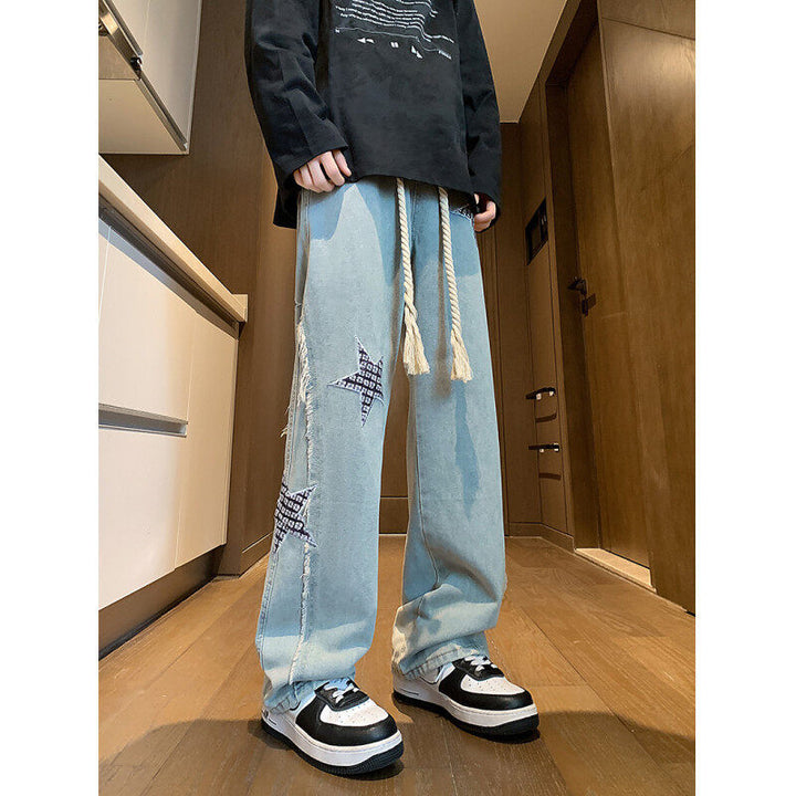 Damen Weite High‑Waist Denimhose mit Stern‑Applikationen, Fransen‑Seitenschlitzen und Kordelbund Echo Archiv