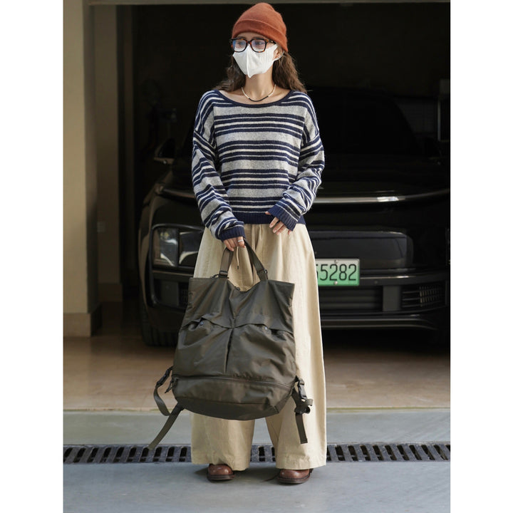 Damen Weicher Oversize-Streifenpullover mit U-Boot-Ausschnitt und Flauschoptik Echoarchiv